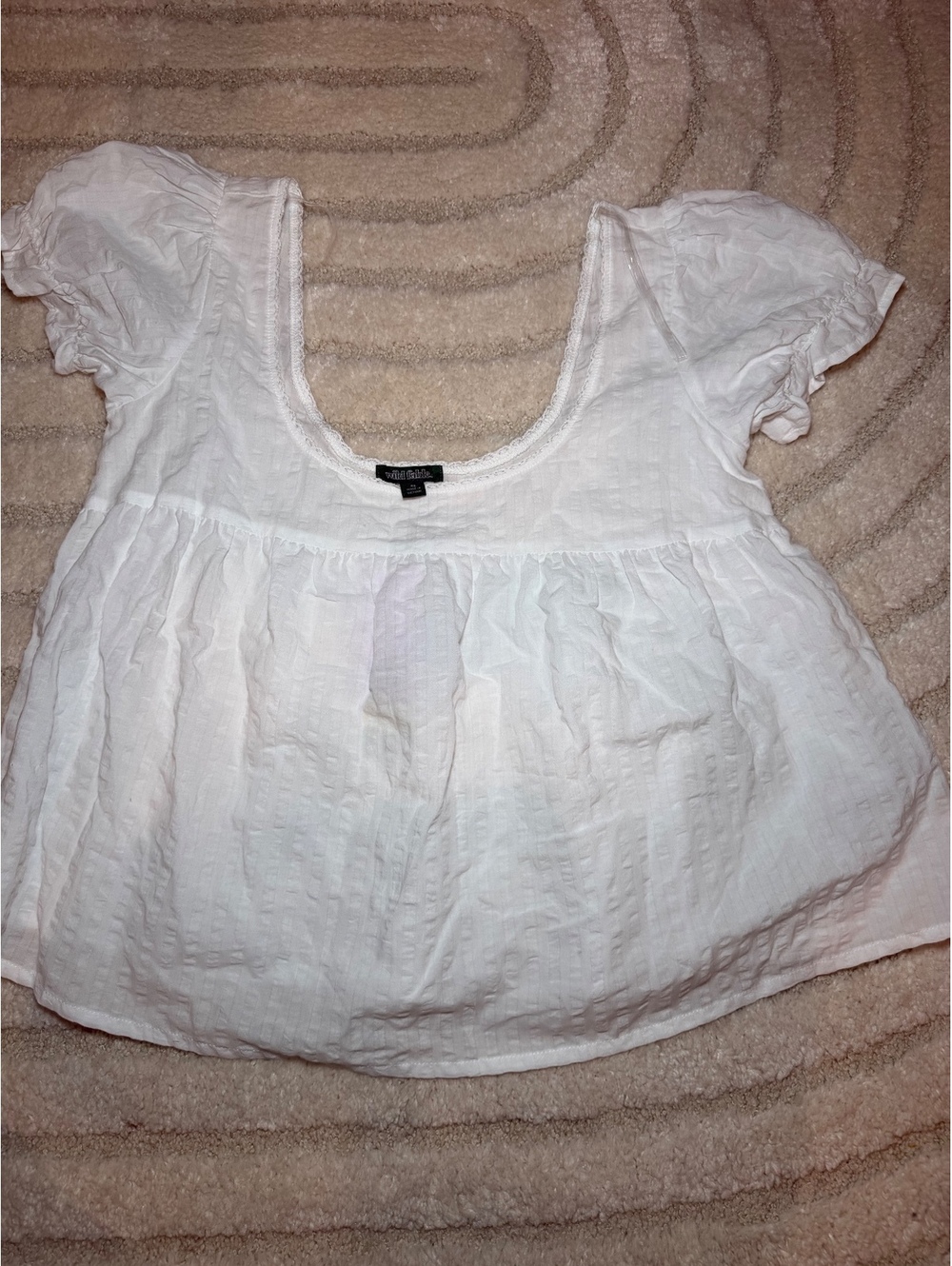 Women’s size XS white baby doll top
